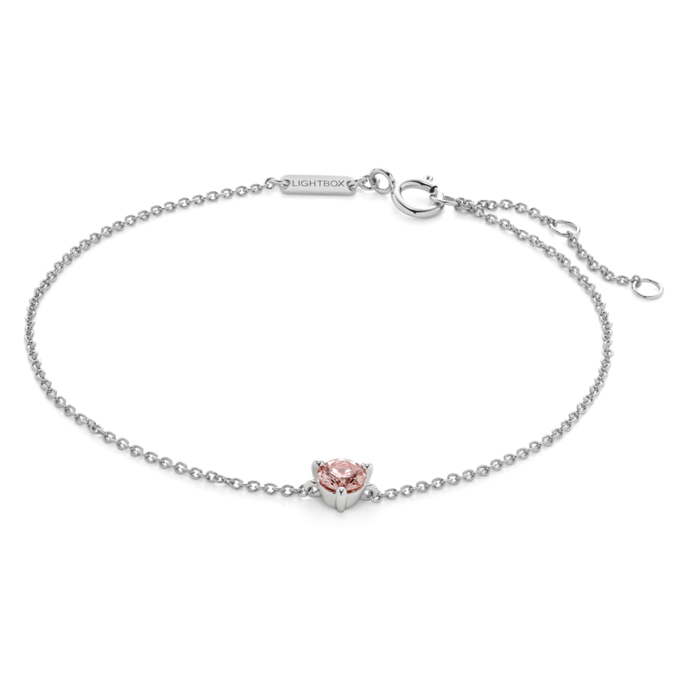 Front view of pink 0.25 carat round brilliant solitaire bracelet in 14k white gold