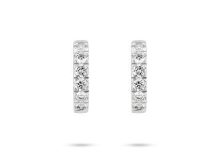 Front view of 1.2 carat total weight pavé huggie hoops in 14k white gold