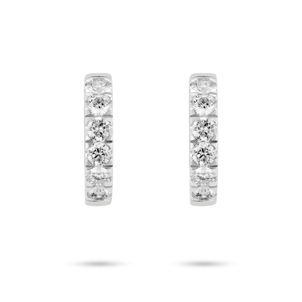 Front view of 1.2 carat total weight pavé huggie hoops in 14k white gold