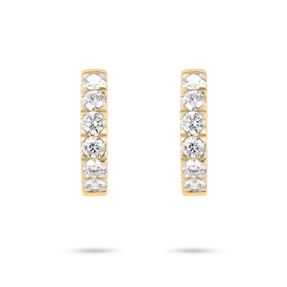 Front view of 1.2 carat total weight pavé huggie hoops in 14k yellow gold