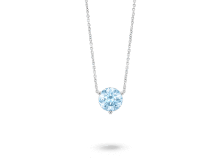 Front view of a blue 2 carat round brilliant pendant in a 14k white gold solitaire setting