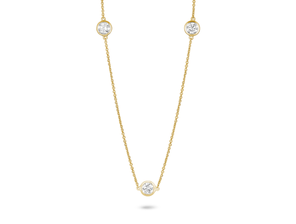 Front shot of 0.75 carat station necklace in 14k yellow gold